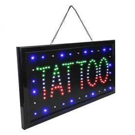 Rótulo luminoso para tienda de tatuajes